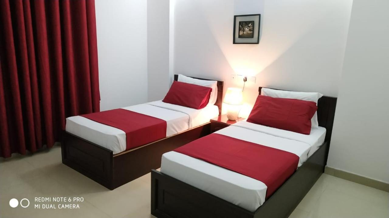 Azaiba Hotel Apartments 马斯喀特 外观 照片